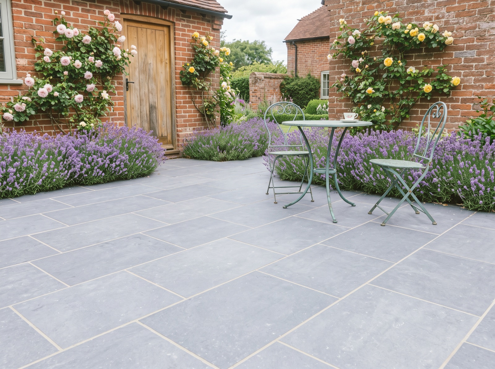 Black Fossil Porcelain Anti Slip Paving Slabs Pack 21.6m2 900x600 20mm shown laid in a garden setting