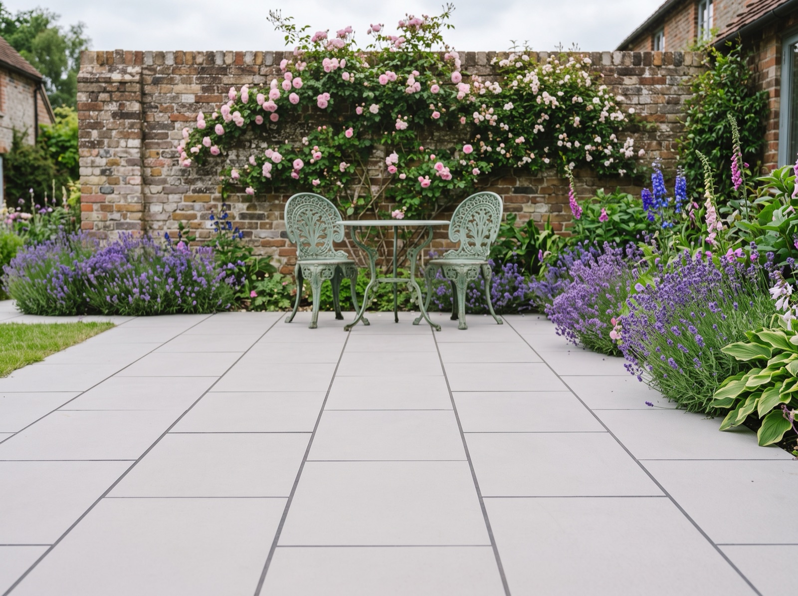 Crema Cream Porcelain Anti Slip Paving Slabs Pack 21.6m2 900x600 20mm shown laid in a garden setting