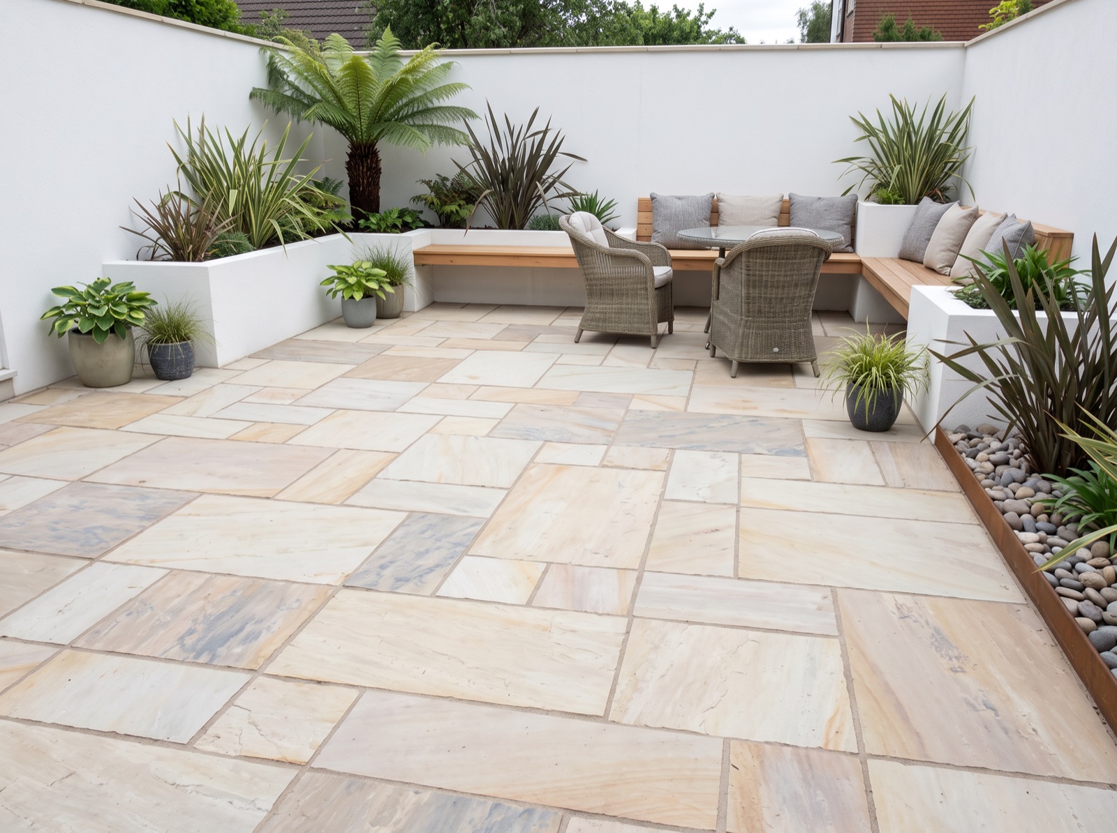 Fossil Mint Indian Sandstone Patio Paving Slabs - NATURAL Finish shown laid in a garden setting