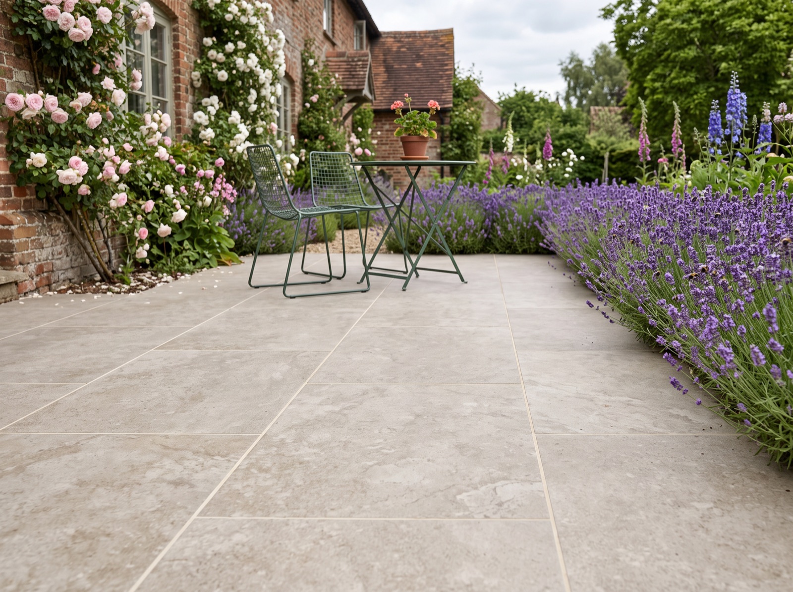 Smoke Beige Outdoor Porcelain Paving Slabs – 900×600 – 20mm shown laid in a garden setting