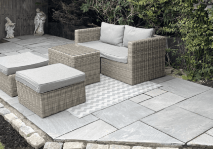 Natural sandstone paving in an outdoor living area